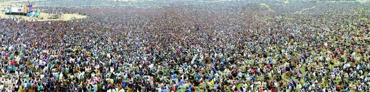 A panoramic historic crusade crowd stretching toward the horizon