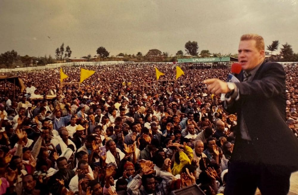 Karl Härgestam preaching before a large Joshua Campaign crowd