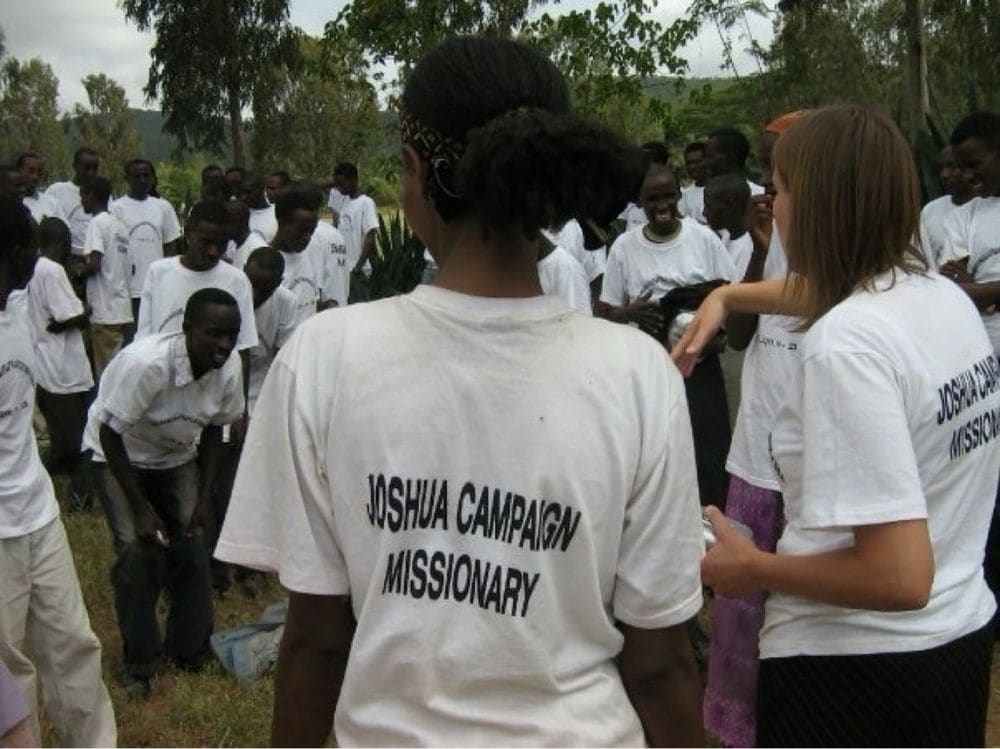 A group of young people wearing Joshua Campaign Missionary shirts